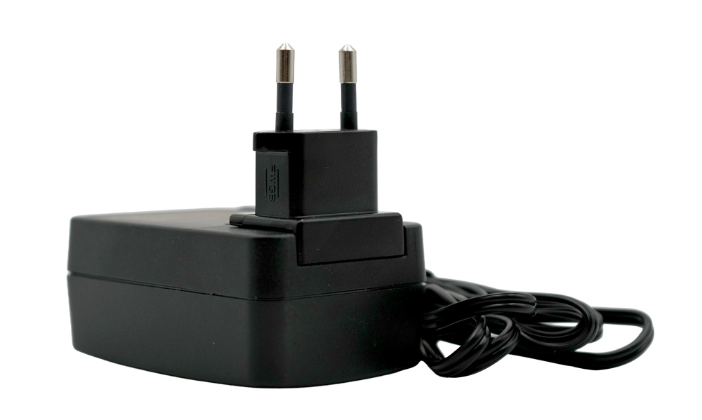 Plug-in power supply for Testomat LIMIT, our item number 30996, horizontal, slanted, left side