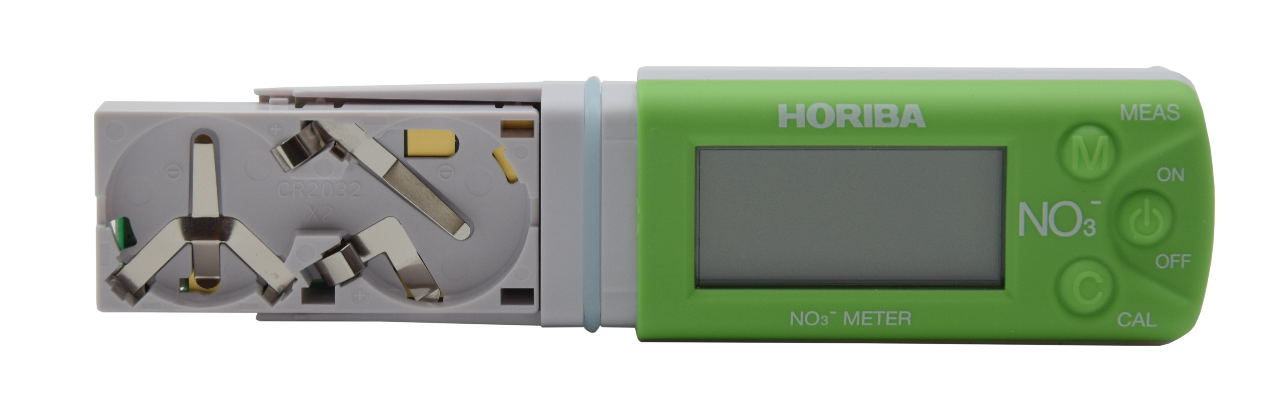 Horiba NO3 11 tester housing close-up, casing, display and control buttons in detail, digital LCD and housing texture, portable nitrate analysis device, empty battery compartment visible